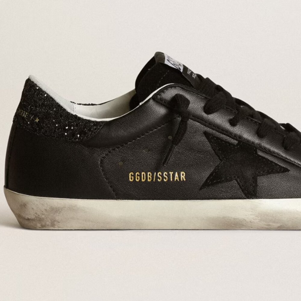 Golden Goose Super Star in Black Nappa with black star and glitter heal tab